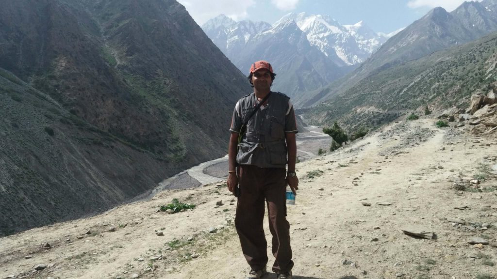 Standing before Rangrik Rang Peak and Charang Village is at the background