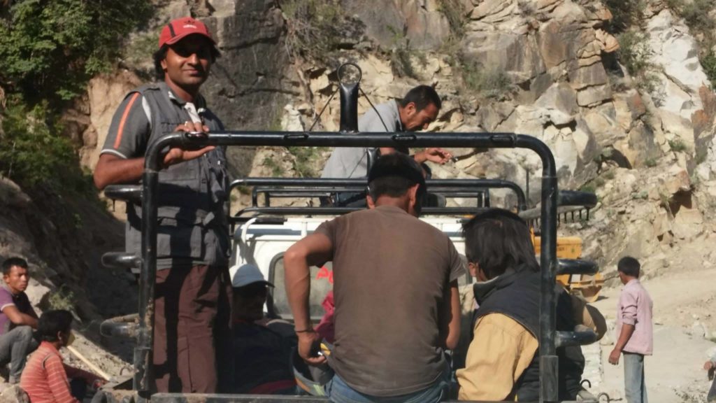 Enroute Lumbar..me enjoying the rough ride. Guide Sohan Negi in the front. You know i am an adventurer, i cant take the front seat!!!