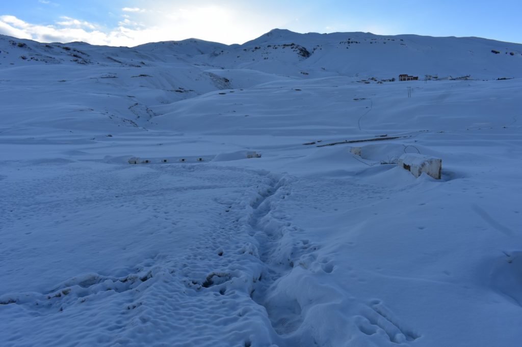 Snowy trail leading from Kibber to Chicham bridge