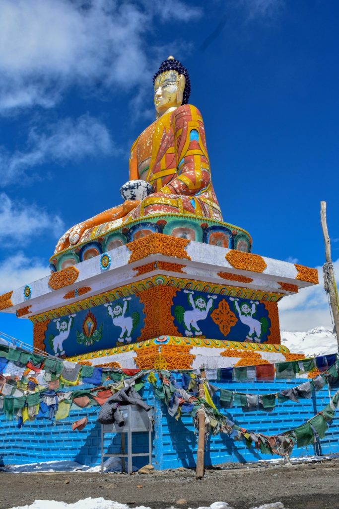 Sun-lit statue of Buddha at Langza