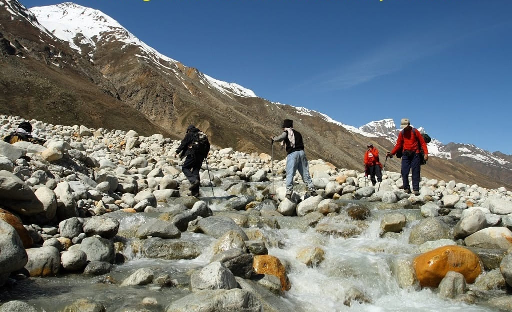 Crossing the last stream before reaching Baspa glacier snout