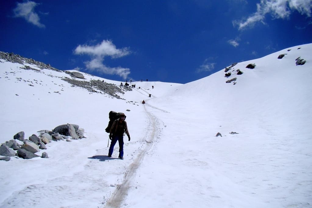 Glissading over glacier below Lamkhaga pass