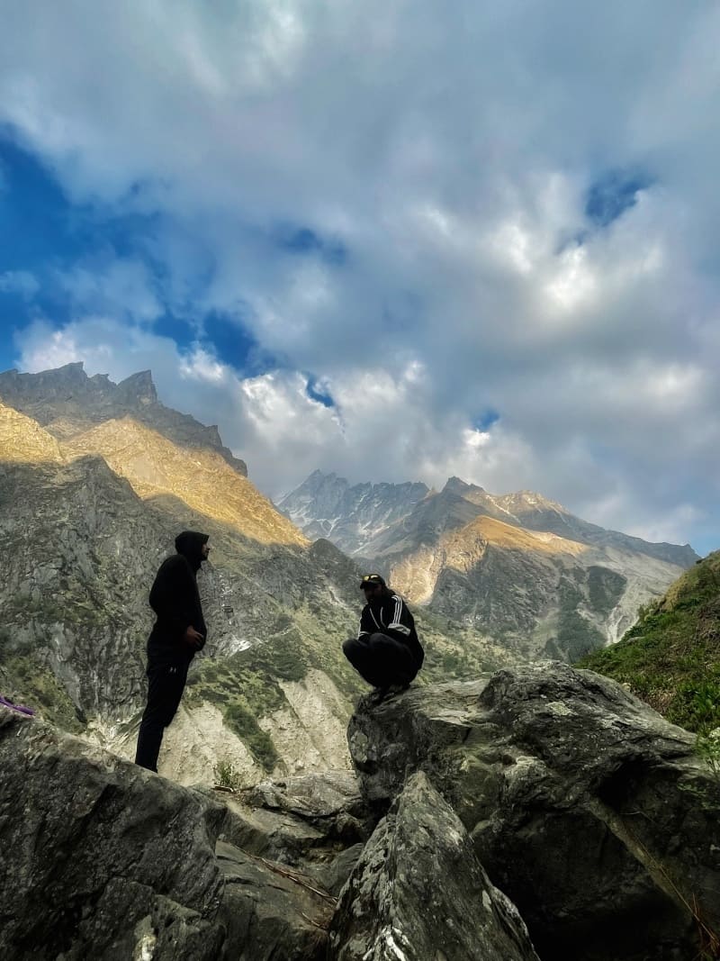 Trekkers having conversation before reaching the camp