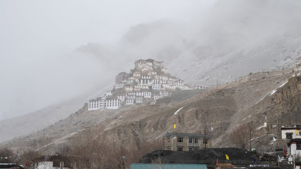 Key monastery enveloped in snowy mist