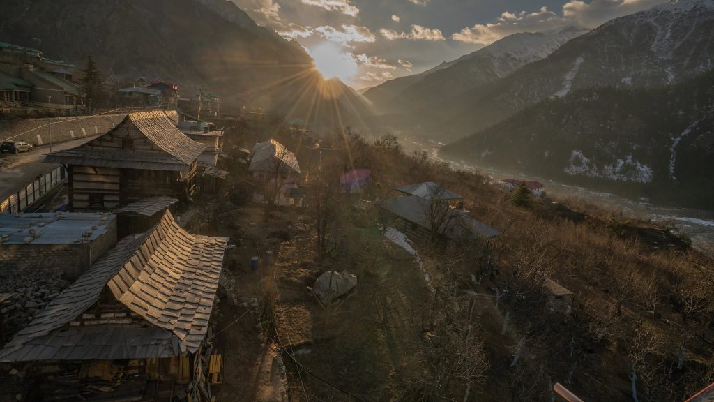 The last golden sunlight of the day spreading across Sangla
