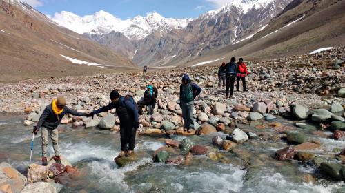 Crossing the stream near Gundar. Enroute Lamkhaga pass trek